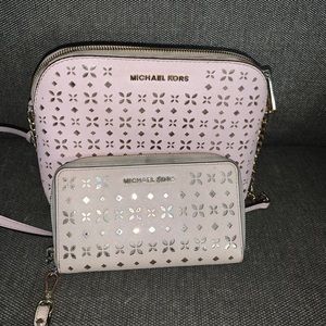 Perforated leather matching MK satchel and wallet